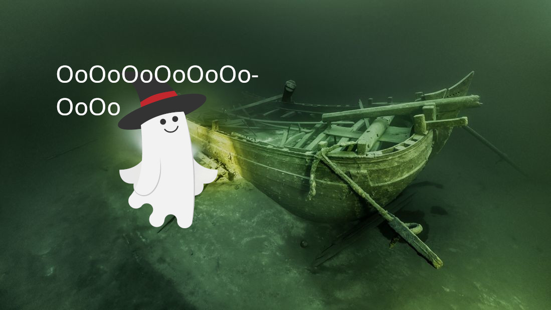 A ghost with a witch hat by a sunken ship.